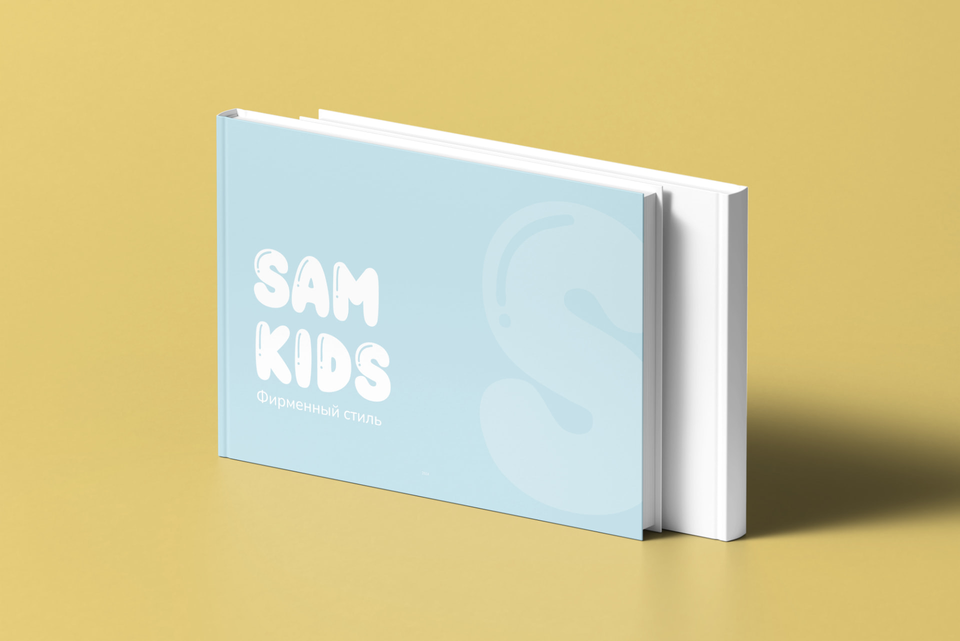 Sam Kids brand book mockup with blue cover and white logo